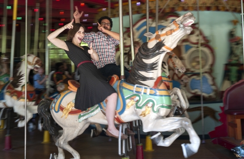 Marina Tempelsman and Nicco Aeed on a carousel