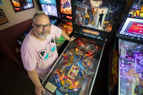 Matt Wall with pinball machines