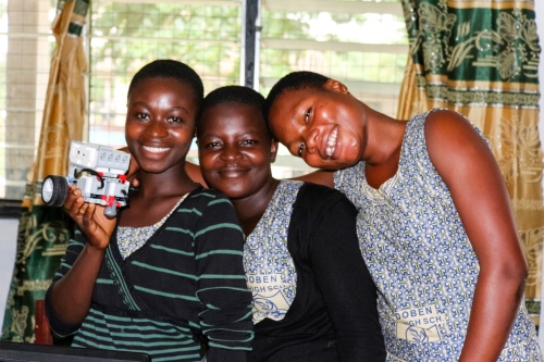 Women stand smiling in Africa 