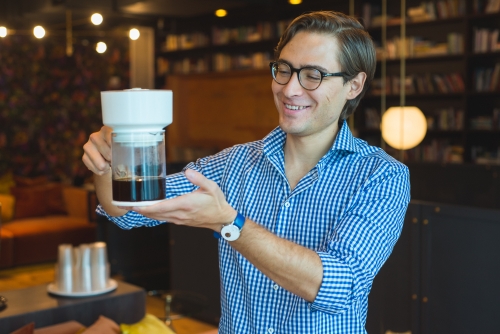 Eduardo Umana holding a FrankOne