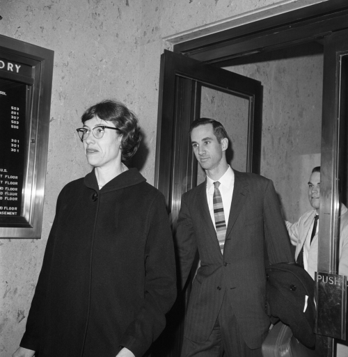 Black-and-white photo of Ruth Hyde Paine and Michael Paine entering