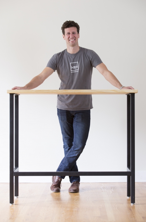 Ben Young ’09 with a table his company created
