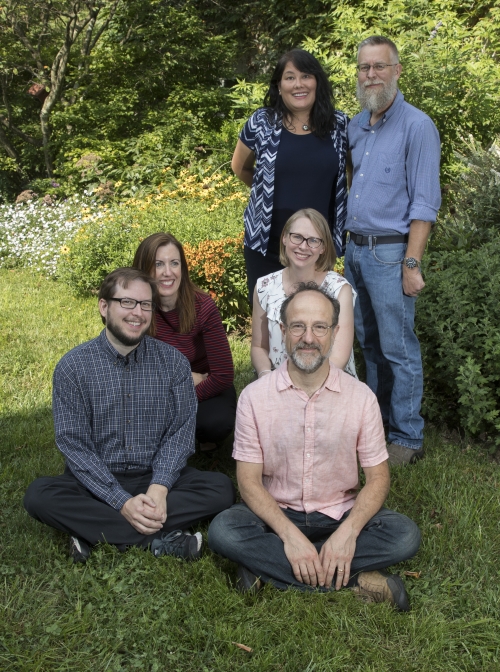 Bulletin staff sitting in Swarthmore's Pollinator Garden.