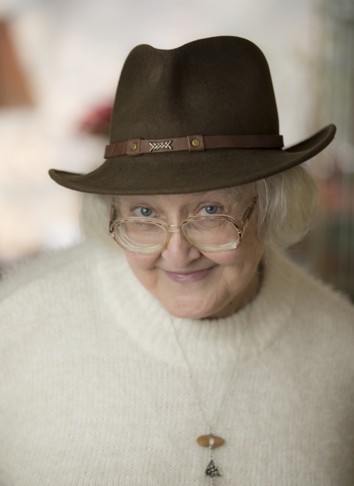 Patricia Brooks Eldridge ’60 posing in a brown fedora