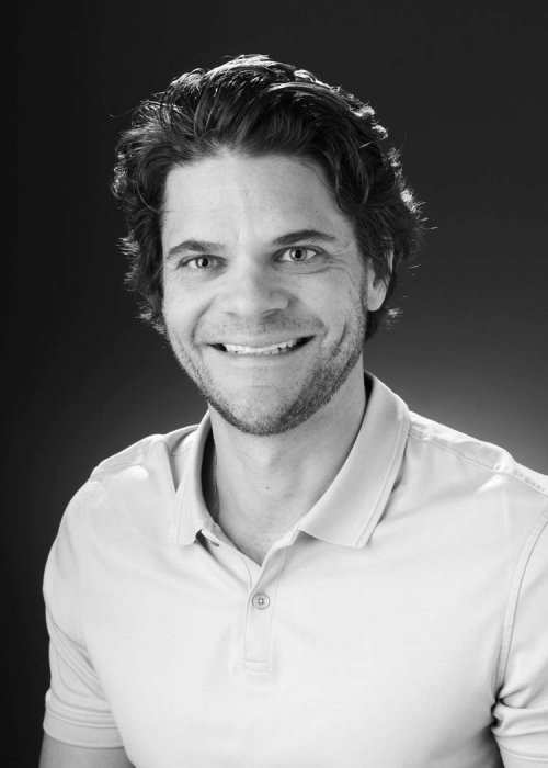 Black-and-white headshot of Joe Hackel