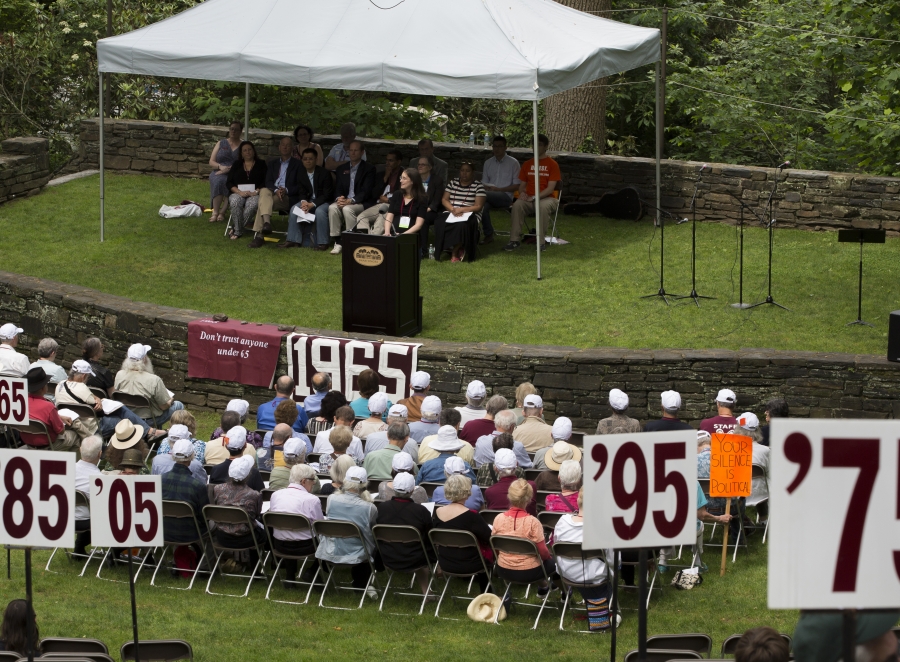 a group of attendees sit together