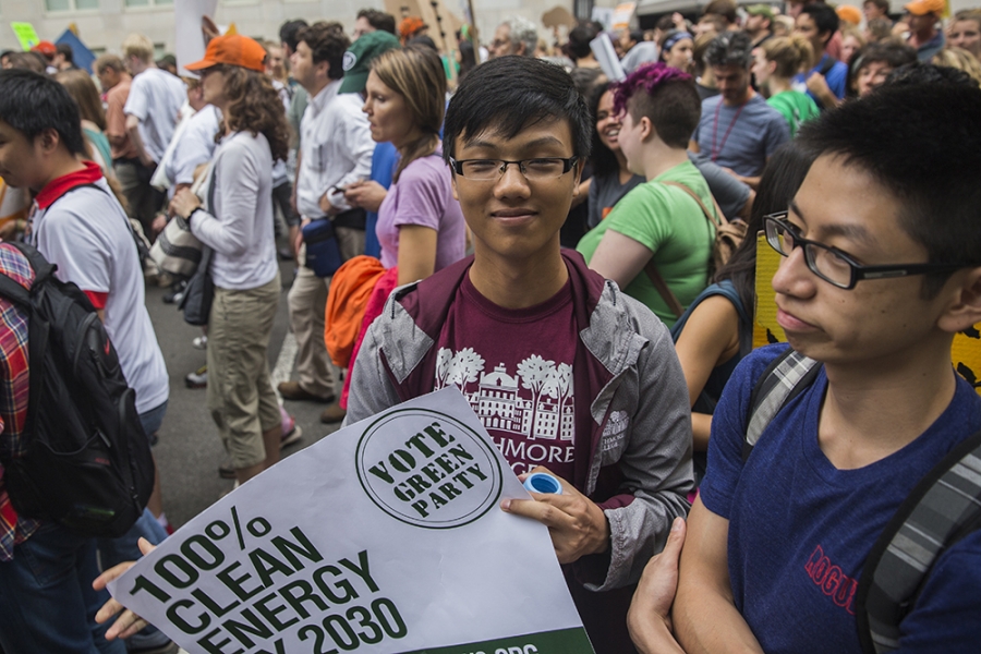 (From left to right) Ye Linn Robin '18 and Matthew Ho '18 at the March. The two freshmen were part of a group of 200+ Swarthmore students in NYC Sept. 21 to participate in the People's Climate March, the largest climate justice march in history. Photo by Martin Froger-Silva '16.