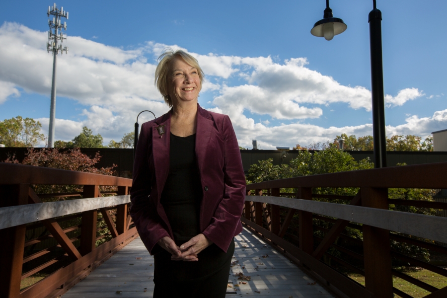 Margaret Nordstrom ’70 stands on a beautiful walkway in nature