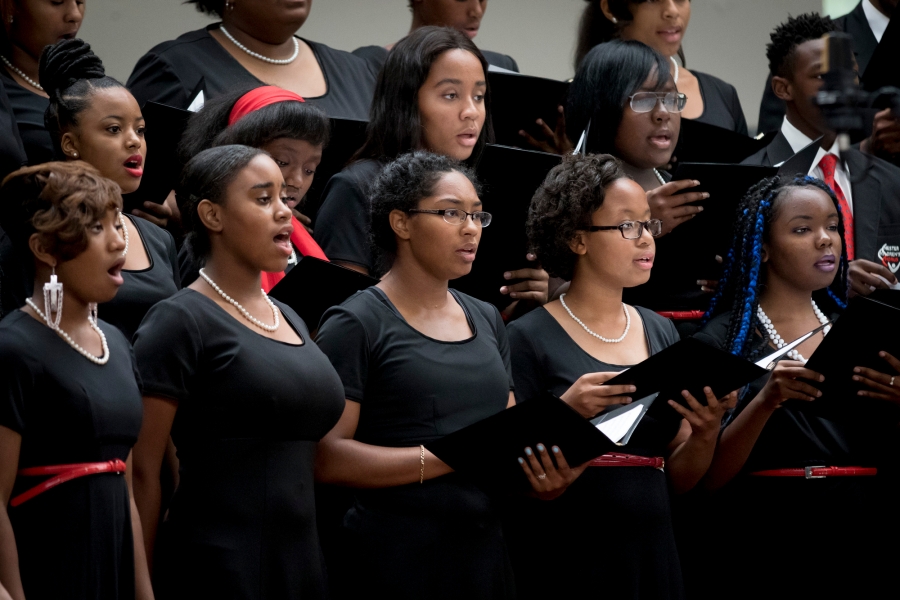 children singing at the ceremony