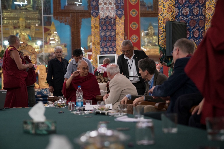 scott gilbert in ornate room with dalai lama and monks