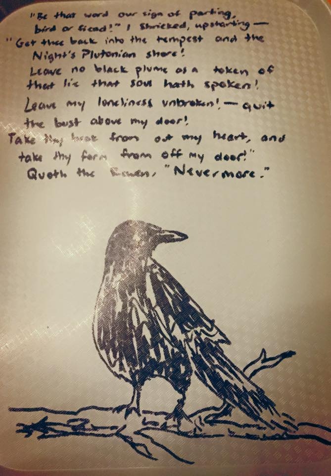 Sharples tray with a raven drawn on it and an excerpt of Poe's "The Raven" written on it by a student