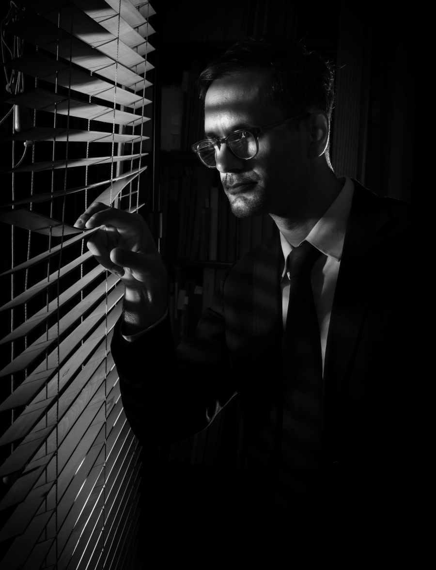 Librarian for Digital Initiatives and Scholarship Nabil Kashyap broods in black and white.