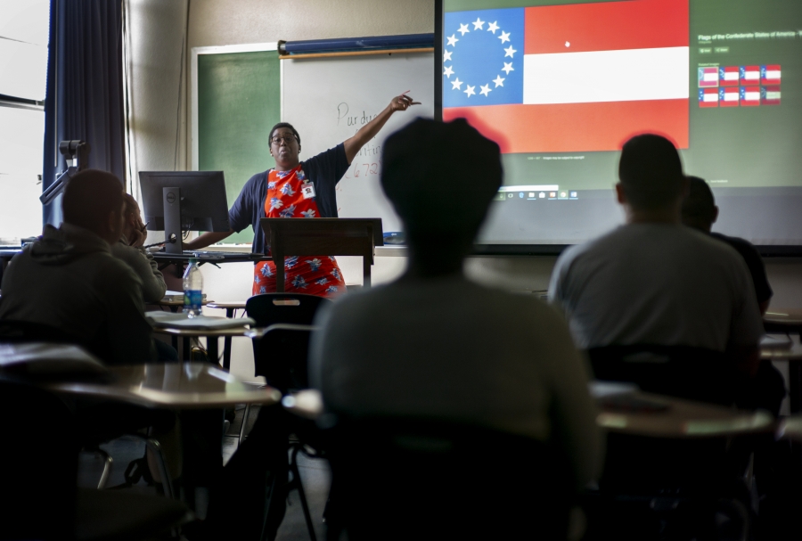 Kimberly St. Julian-Varnon teaching at the front of a classroom