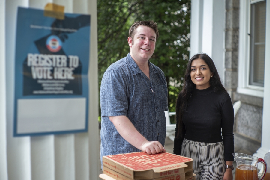 two students help voter registration 