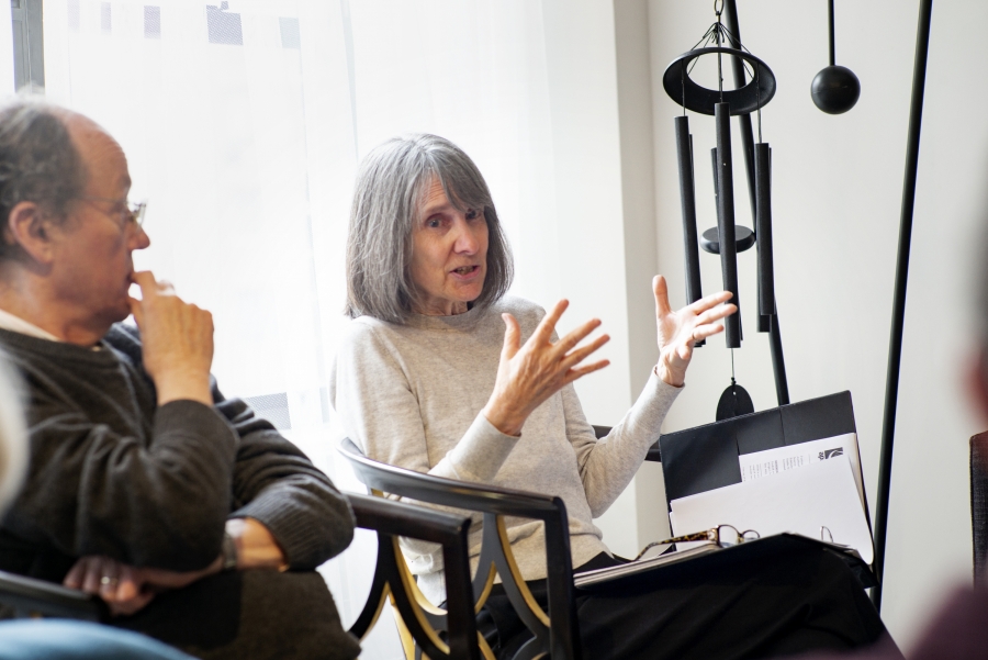 Woman talks in reading group 