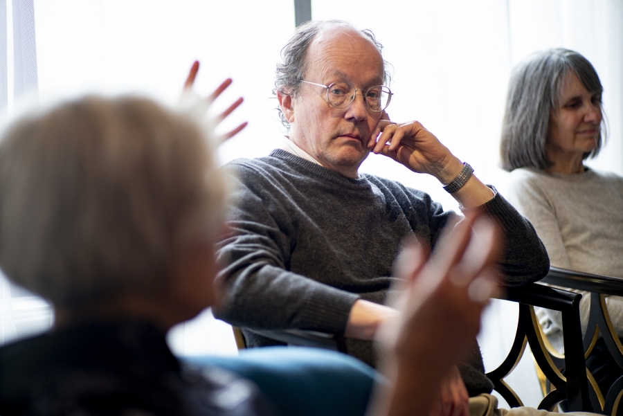 Man listens in reading group 