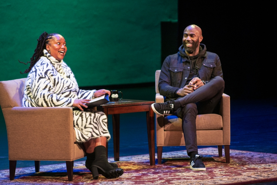 Prof. Nina Johnson and football player Malcolm Jenkins talk on a stage 