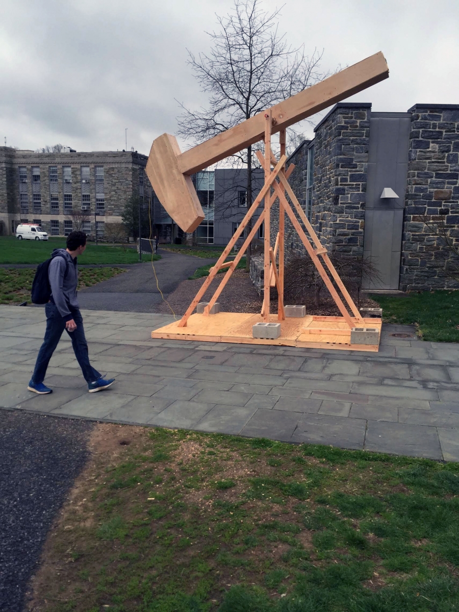 2016: Students erected the “Lang Derrick for Community Investment and Environmental Justice” to extract “crude java” from under the College.