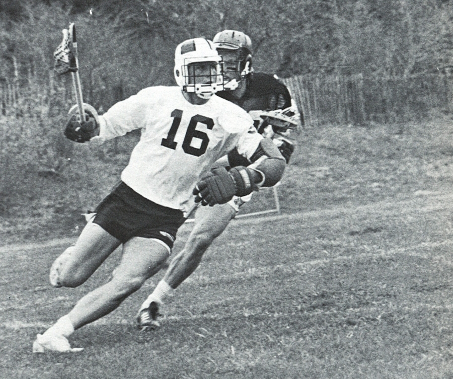 black and white photo of lacrosse player