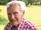 Edward Johnson ’46 in a red checkered shirt.
