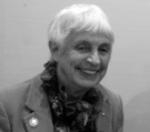 Black and white photo of a smiling Anne Fristrom