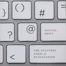 The cover of The Digital Shift featuring punctuation marks on a computer keyboard