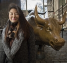 Christine Kim ’17 with the bull statue on Wall Street.