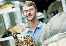  Tyler Lyson holding a Hawksbill sea turtle.