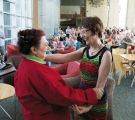 Lisa Scolaro embracing President Rebecca Chopp.