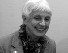 Black and white photo of a smiling Anne Fristrom