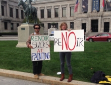 playful protestors demonstrate against what they view as bad art in front of an art museum