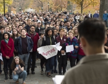 Swarthmoreans attend a walk-out in protest of Donald Trump's political agenda.