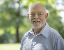 portrait of Bob Freedman ’58 in front of trees