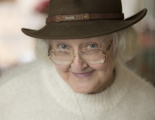 Patricia Brooks Eldridge ’60 posing in a brown fedora