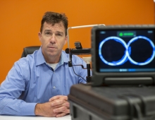Pat Carney with his EyeGuide Focus device