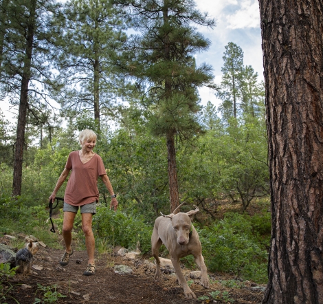 Susan Washburn hiking with her dogs