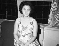black and white photo of Ethel Rosenberg in her home
