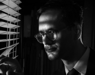 Librarian for Digital Initiatives and Scholarship Nabil Kashyap broods in black and white.