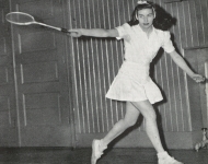 Gloria Evans Dillenbeck Dodd ’47 swinging a tennis racket.