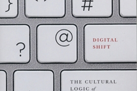 The cover of The Digital Shift featuring punctuation marks on a computer keyboard