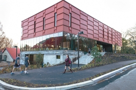 The new Matchbox exterior is a building with red exterior and glass.