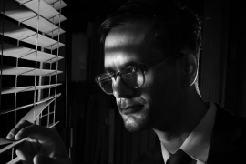 Librarian for Digital Initiatives and Scholarship Nabil Kashyap broods in black and white.