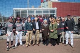 a crowd assembles to celebrate new developments on the baseball field