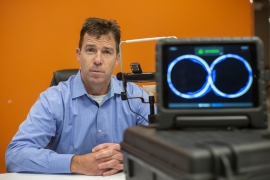 Pat Carney with his EyeGuide Focus device