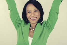 book cover of Colorful Leadership showing Gloria Chan ’02 raising her arms triumphantly