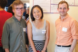 Three students smiling for a photo at TechChange