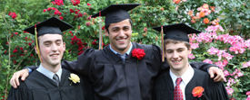 Graduates pose for a photo at Commencement.