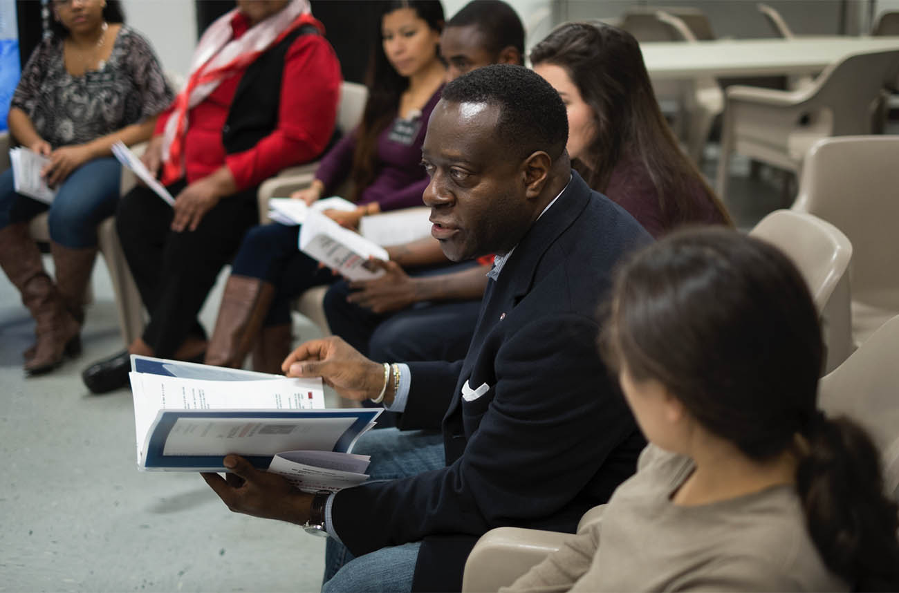 professor talking to a group of people