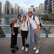 Group of Swarthmore students in front of buildings during COP28 conference