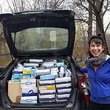 Melanie Leeds with car trunk full of PPEs for healthcare workers.
